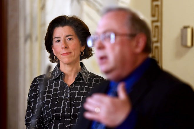 Providence, RI, April 5, 2020 - RI Governor Gina Raimondo listens RI Dept of Health's Dr. James McDonald, as he answers reporter questions during the Sunday press conference.  Health Dept. at the daily COVID-19 press conference in the State Room at the RI State House on Sunday afternoon.  [The Providence Journal / Kris Craig]