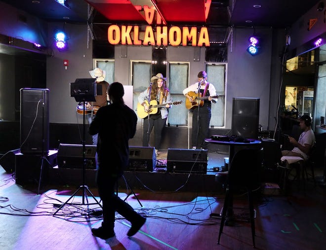 Mallory Eagle performs with Kevin Foster and Adam Duran during a streaming session at Ponyboy, Tuesday, March 24, 2020. [Photo by Doug Hoke/The Oklahoman]