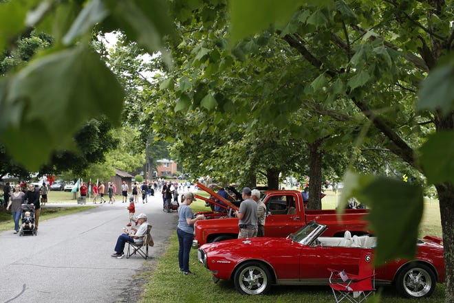 Locals check out classic cars at the Marigold Festival in Winterville on Saturday, May 11, 2019. [Photo/ Joshua L. Jones, The Athens Banner-Herald]