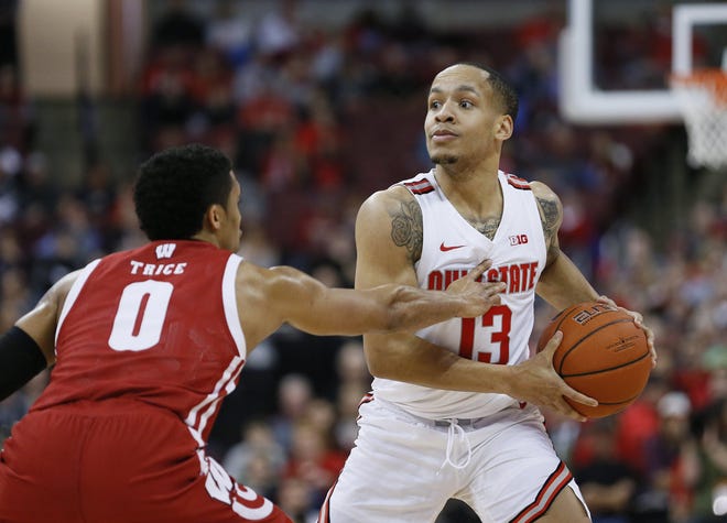 Buckeyes guard point guard CJ Walker is living in Indianapolis with his girlfriend while caring for their 9-month-old daughter, Summer. [Adam Cairns/Dispatch]