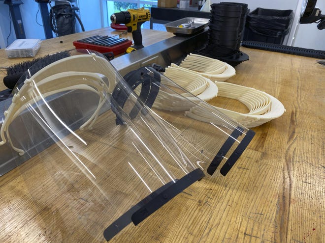 Fifteen Ohio companies are teaming up to produce plastic face shields similar to these made at the NASCAR Research and Development Center in North Carolina. [Eric Jacuzzi/NASCAR]