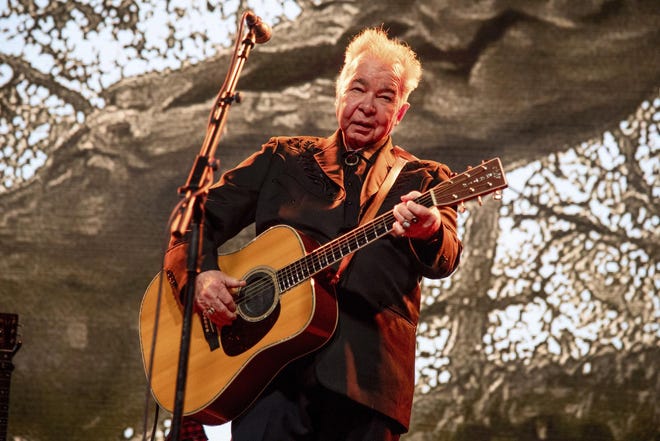 John Prine performs at the Bonnaroo Music and Arts Festival in Manchester, Tenn., in 2019. Prine died on Tuesday from complications of the coronavirus. He was 73. One of his favorite spots to visit was Sarasota. [Photo by Amy Harris / Invision / AP]