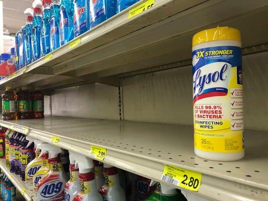 The last package of Lysol disinfectant wipes sits on a shelf at a Piggly Wiggly in Athens, Georgia on March 13. Shoppers have been snapping up disinfectants and cleaning supplies as the coronavirus spreads. (Photo: Joshua L. Jones, AP)