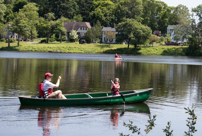 Amelia Delaney, 6, and her dad, Sean, start their kayaking adventure at the sixth annual Legacy Art/Music/Food/FunFestival at the Governor Oliver Ames Estate on Sunday, June 23, 2019. [Wicked Local file photo/Charlene A. McNeil]