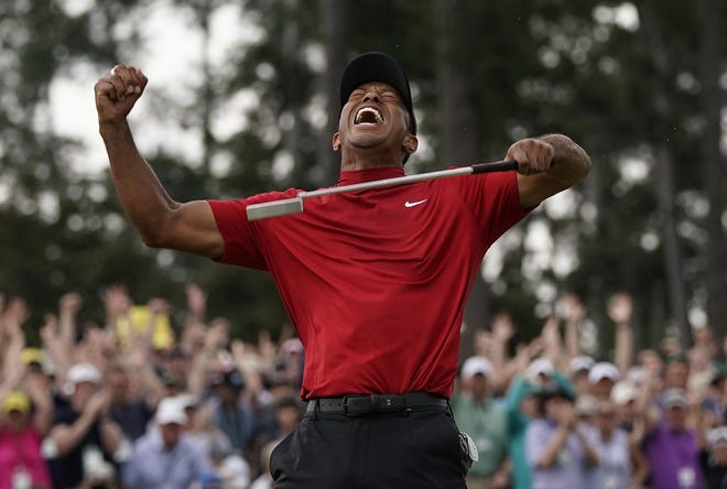 Tiger Woods reacts as he wins the Masters on April 14, 2019 in Augusta. [DAVID J> PHILLIP/AP FILE PHOTO]