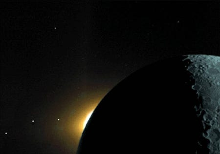 The plane of the ecliptic is illustrated in this Clementine star tracker camera image from 2017, which reveals (from right to left) the moon lit by earthshine; the sun’s corona rising over the moon’s dark limb; and the planets Saturn, Mars and Mercury. [NASA]