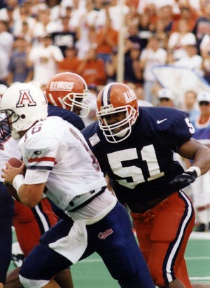 Kevin Hardy was part of an elilte University of Illinois linebacker group, and now has joined another elite group — the Illini Athletic Hall of Fame. [ASSOCIATED PRESS]