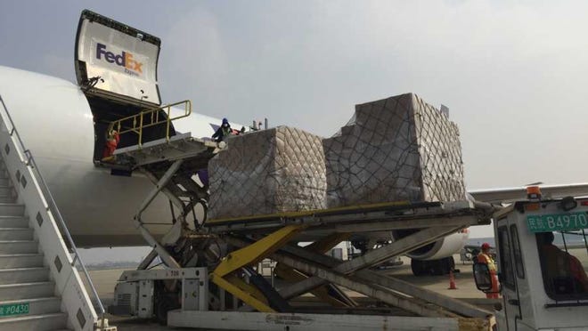 Some 91,000 pounds of personal protective equipment is loaded onto a plane in China. The desperately needed supplies will be flown to New Hampshire. [Courtesty photo from the Office of Gov. Chris Sununu]