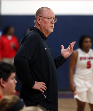Crestview girls basketball coach Steve Williams looks on during a win against Fort Walton Beach during a past season. [MICHAEL SNYDER/DAILY NEWS]