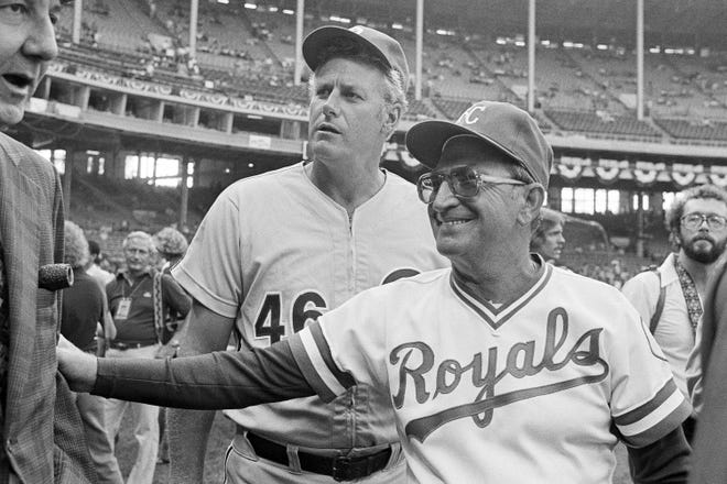 Philadelphia Phillies manager Dallas Green left, manager of the National League All Stars, goes over ground rules of the game with American League team manager Jim Frey, manager of the Kansas City Royals, on Sunday, August 9, 1981 in Cleveland. [The Associated Press]