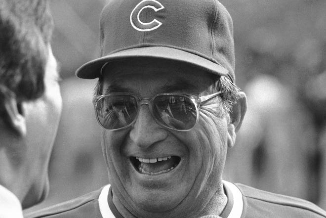FILE - In this Oct. 4, 1984, file photo, Chicago Cubs manager Jim Frey enjoys a laugh during an interview prior to the start of Game 3 in the National League Championship Series against the San Diego Padres in San Diego. Frey, who managed the Kansas City Royals to the 1980 AL pennant and the Chicago Cubs to within one win of the 1984 World Series, has died. He was 88. Frey died Sunday, April 12, 2020, at his home in Ponte Vedra Beach, Florida, according to the Atlantic League’s Somerset Patriots, the minor league team he had been affiliated with since its launch in 1998.(AP Photo/File)