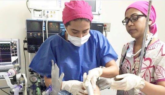 Veronica Mazzei, 27, of Union City intubates a patient during her anesthesiology rotation in Venezuela. Mazzei moved to the United States three years ago and wants to help New Jersey doctors in their fight against the coronavirus. [COURTESY VERONICA MAZZEI]