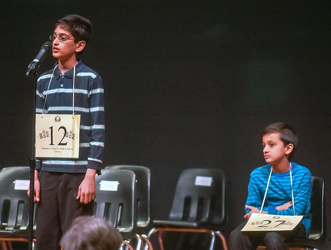 In the 2013 Regional Spelling Bee, Sriram Hathwar, left, faced the strongest competition from his own younger brother, Jairam, seated at right. Sriram was a national Bee champ the following year. [The Leader Files]