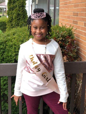 Imani George, 8, poses in her birthday outfit.