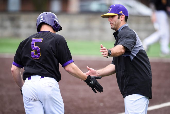 Hickman head baseball coach Mason Mershon, right, and fellow Columbia coaches have turned their attention to a potential return to the field for offseason programs this summer, though there remains uncertainty due to the coronavirus pandemic. [Eric Blum/Tribune]