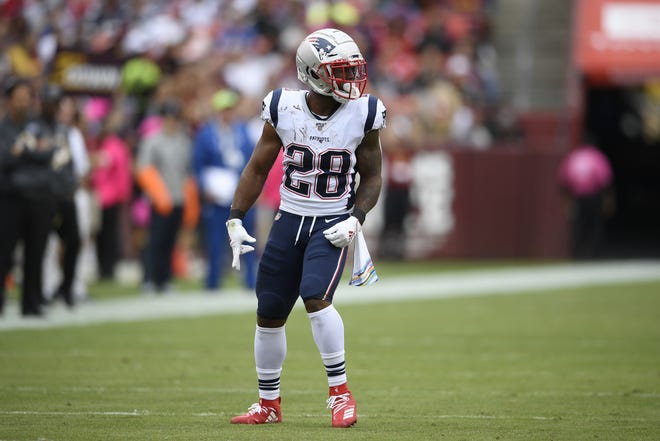 New England Patriots running back James White (28) stands on the field during the first half of a game against the Washington Redskins on Oct. 6, 2019, in Washington. [AP File Photo/Nick Wass]
