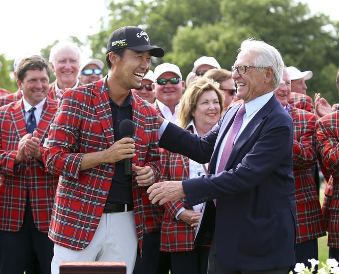 Kevin Na, front left, is congratulated by Charles Schwab after winning The Charles Schwab Challenge at Colonial last year. The PGA Tour laid out an ambitious plan to resume its season April 16, with hopes of a restart at Colonial on June 11-14 and keeping fans away for at least the first month. [Associated Press File Photo]