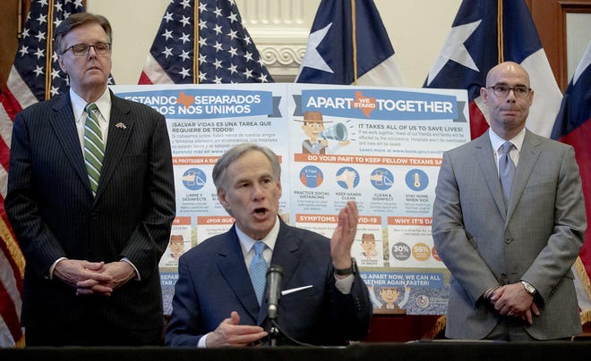 Gov. Greg Abbott, flanked by Lt. Gov. Dan Patrick, left, and House Speaker Dennis Bonnen, R-Lake Jackson, on March 31 orders Texans to stay at home except for work or errands considered essential, such as grocery shopping or to pick up medication at a pharmacy. [NICK WAGNER/AMERICAN-STATESMAN]