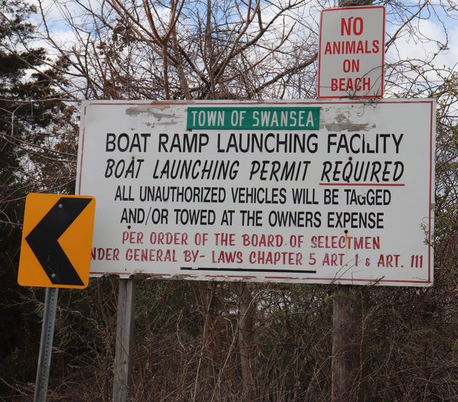 PHOTO BY GEORGE AUSTIN/THE SPECTATOR/SCMG This sign notifies people not to use the access road to go to the Swansea boat ramp if they don't have a permit.