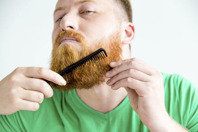 When growing out a new beard, experts recommend trimming it about once a week. [Dreamstime]