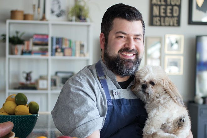 Chef BJ Lieberman and his dog, Phyl, at his Downtown apartment