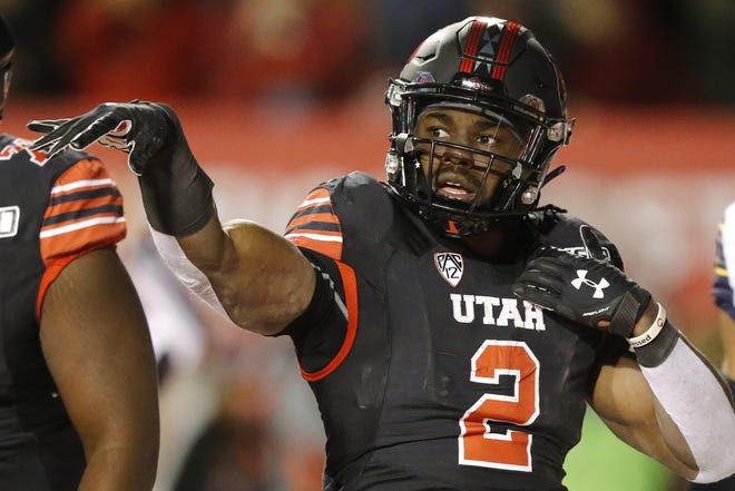 Utah's Zack Moss is a versatile running back and the only knock against him is his lack of game-breaking speed. [AP Photo/Rick Bowmer]