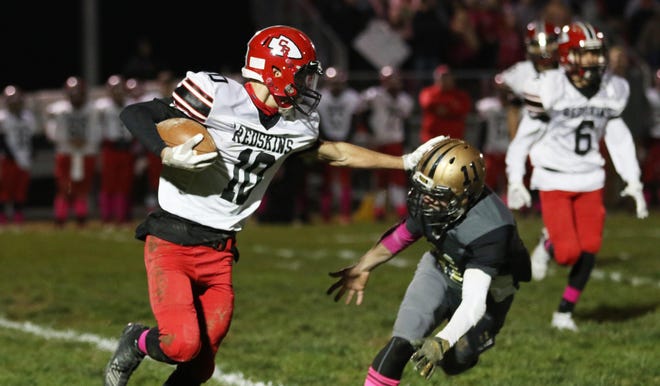 Coshocton's Nathan Fauver pushes away River View defender Orin McKee in a game last season. The teams will be in separate divisions in the new Muskingum Valley League layout, but will continue their rivalry in all team sports. (Photo: Chris Crook/Coshocton Tribune)