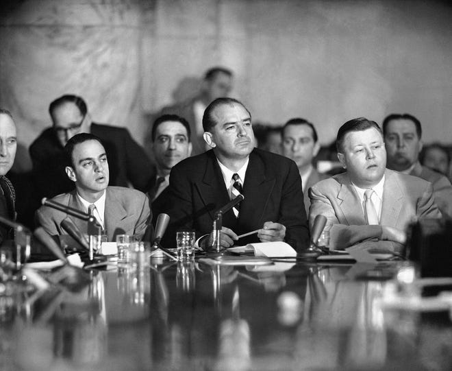Senator Joseph McCarthy (R-Wisconsin), juts out his jaw as he listens to testimony April 22, 1954, by Maj. Gen. Miles Reber. Reber said McCarthy and his aide, Roy Cohn, pressed him for an officer’s commission for G. David Schine, committee consultant eventually drafted into the Army as a private. [THE ASSOCIATED PRESS]