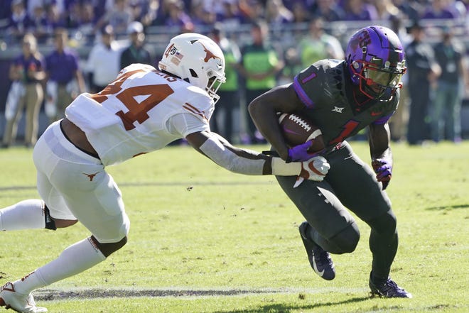 TCU wicd receiver Jalen Reagor runs with the ball after catching a pass against Texas in October. [LOUIS DELUCA / ASSOCIATED PRESS FILE]