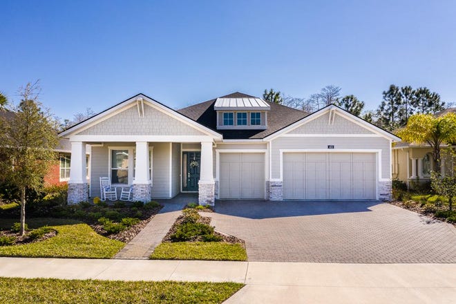 This nearly new craftsman-style home features more than 2,400 square feet of living space that holds four bedrooms and four full baths. [Coldwell Banker Premier Properties]