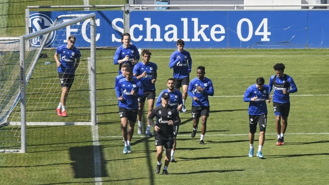 FC Schalke 04 exercises Thursday during a training session in Gelsenkirchen, Germany. The German Bundesliga is expected to start playing the rest of the season in early May behind closed doors due to the coronavirus outbreak. [AP Photo/Martin Meissner]