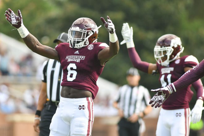 Mississippi State Bulldogs linebacker Willie Gay Jr (6) pumps up the crowd during a 2017 game against the Charleston Southern Buccaneers at Davis Wade Stadium. [Matt Bush-USA TODAY Sports]