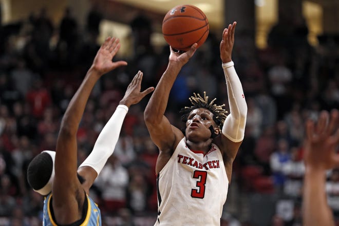 Texas Tech's Jahmi'us Ramsey (3) declared for the NBA draft on Saturday. The freshman guard averaged 15.0 points and 4.0 rebounds per game this past season. [BRAD TOLLEFSON/AP FILE PHOTO]