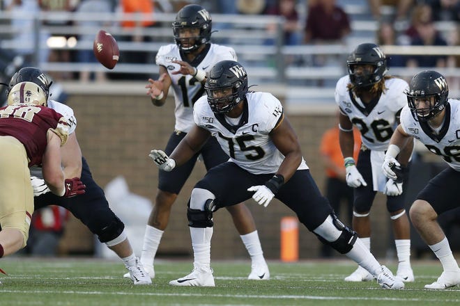Atlantic Division Wake Forest (5-0, 1-0)PHOTO: Wake Forest offensive lineman Justin Herron (75) plays against Boston College during the second half of an NCAA college football game in Boston, Saturday, Sept. 28, 2019. (AP Photo/Michael Dwyer)