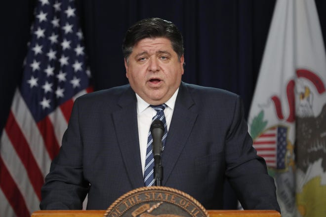 Illinois Gov. JB Pritzker speaks at a news conference in this file photo from March. [AP Photo/Charles Rex Arbogast]