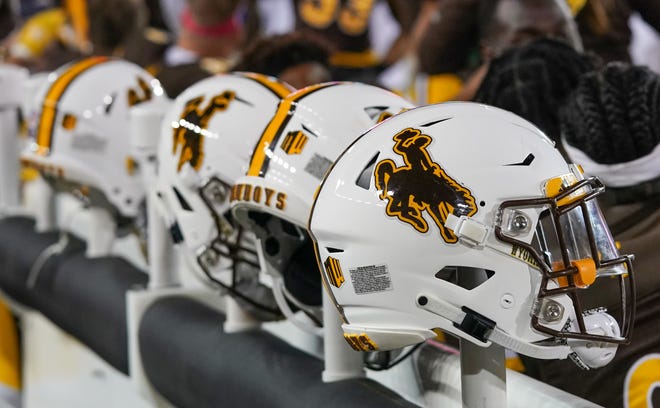 Sep 28, 2019; Laramie, WY, USA; A general view of Wyoming Cowboys football helmets during game against the UNLV Rebels at Jonah Field War Memorial Stadium. Mandatory Credit: Troy Babbitt-USA TODAY Sports