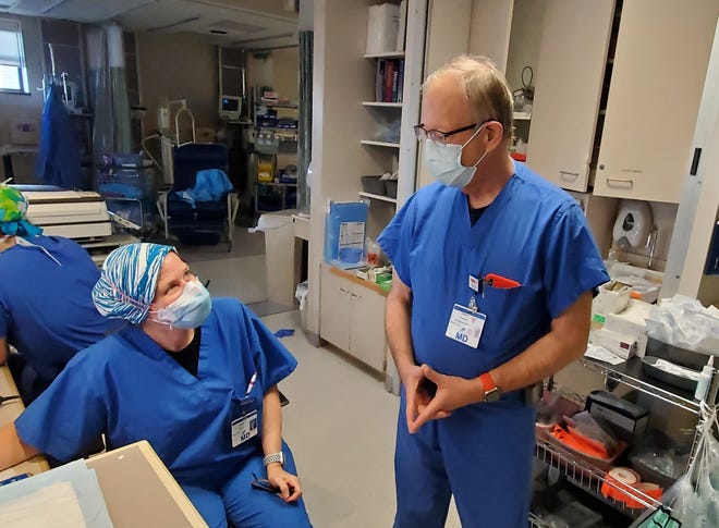 Dr. Carolyn Fruci and Morton Hospital's Chief Medical Officer Dr. Charlie Thayer are seen here near the intensive care unit of what has been transformed into a COVID-19 medical center.

Submitted photo