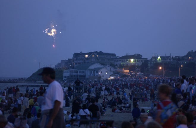 Spectators flock to Falmouth Heights Beach every year for the Fourth of July fireworks, one of many signature events canceled for this summer. [Cape Cod Times file]