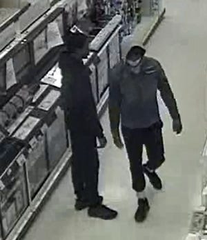 Westborough Police are asking for the public's help to identify these two men who stole several electronics items from Target on April 18. [Westborough Police photo]