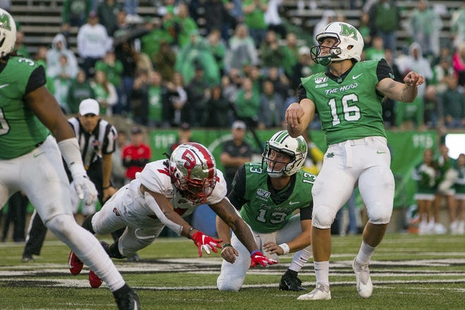 In this Oct. 26, 2019, file photo, Marshall kicker Justin Rohrwasser hits a 53-yard game winning field goal against Western Kentucky. (Sholten Singer/The Herald-Dispatch via AP, File)