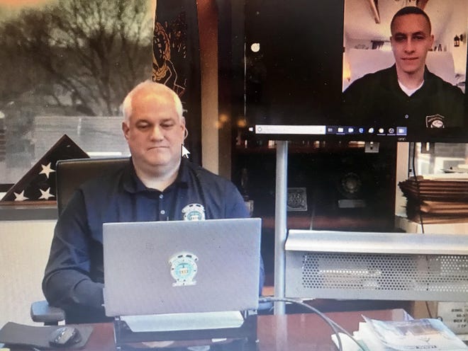 Bucks County District Attorney Matt Weintraub speaks via videoconferencing with Ryan Morrison (top right) the Middletown police officer recovering from the coronavirus. [FACEBOOK SCREENSHOT]
