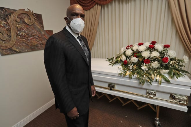 Andre Dawson poses for a photo at his Paradise Memorial Funeral Home in Miami. The baseball Hall of Famer is adjusting to life as a mortician in Miami during a global pandemic. [AP / Wilfredo Lee]