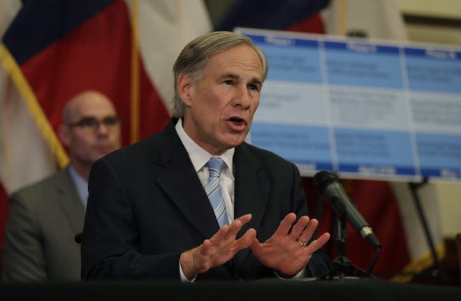 Gov. Greg Abbott announces an effort to allow for the gradual reopening of businesses during a news conference Monday in Austin. [ERIC GAY/THE ASSOCIATED PRESS]