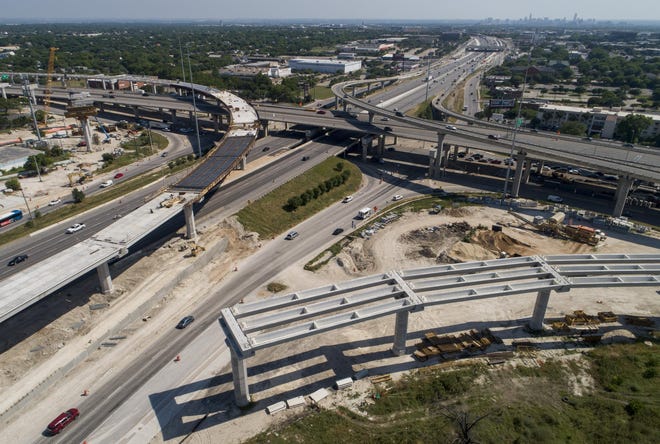 Construction work continues on the interchange at I-35 and U.S. 183 in north Austin on Monday. The Capital Area Metropolitan Planning Organization is set to approve the 2045 Regional Transportation Plan on Monday.  [JAY JANNER/AMERICAN-STATESMAN]