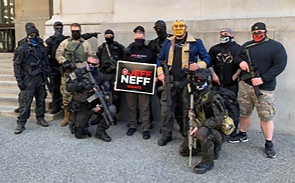 Sewickley Council President and GOP state Senate candidate Jeff Neff survived a move to oust him as council president Friday during a meeting about this photo showing him posing with an armed militia group at an anti-shutdown rally in Pittsburgh. [Photo via @RyanDeto on Twitter]