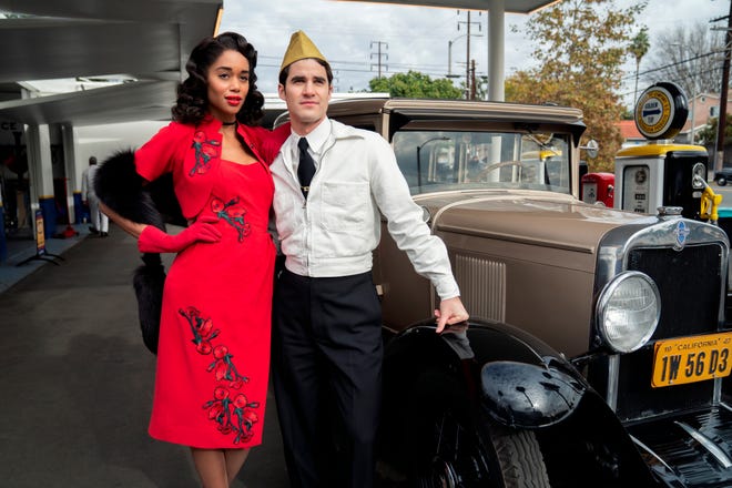Laura Harrier and Darren Criss in “Hollywood.” [Saeed Adyani/Netflix]