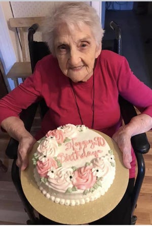 Mabel Thornton shows off her 90th birthday cake. (Submitted photo)