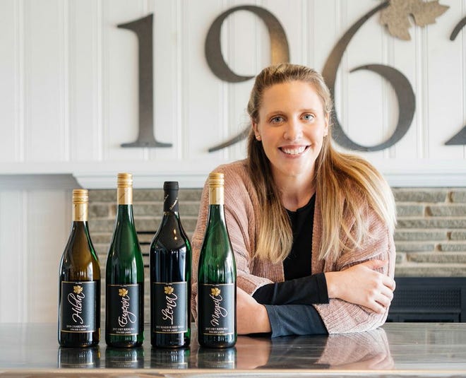 Meaghan Frank with the four Helm Series wines.
