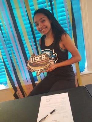 Oriana Hernandez from Lakeside High School’s Track and Field team signed a letter scholarship to run track at University of South Carolina Beaufort on April 29. Hernandez is also a member of the Lane 4 Track Club. (SUBMITTED)