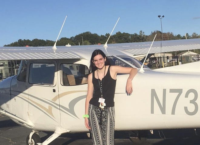 Through a recently completed internship at the Fitchburg Airport Flight Center, Oakmont senior Laura McBride received training in flying a Cessna 152 two-seater plane. McBride, who has career aspirations of becoming a commercial airline pilot, will pusure her secondary education and further her indoor and outdoor track career at Embry-Riddle Aeronautical University in Daytona, Beach, Florida. [Courtesy photo]